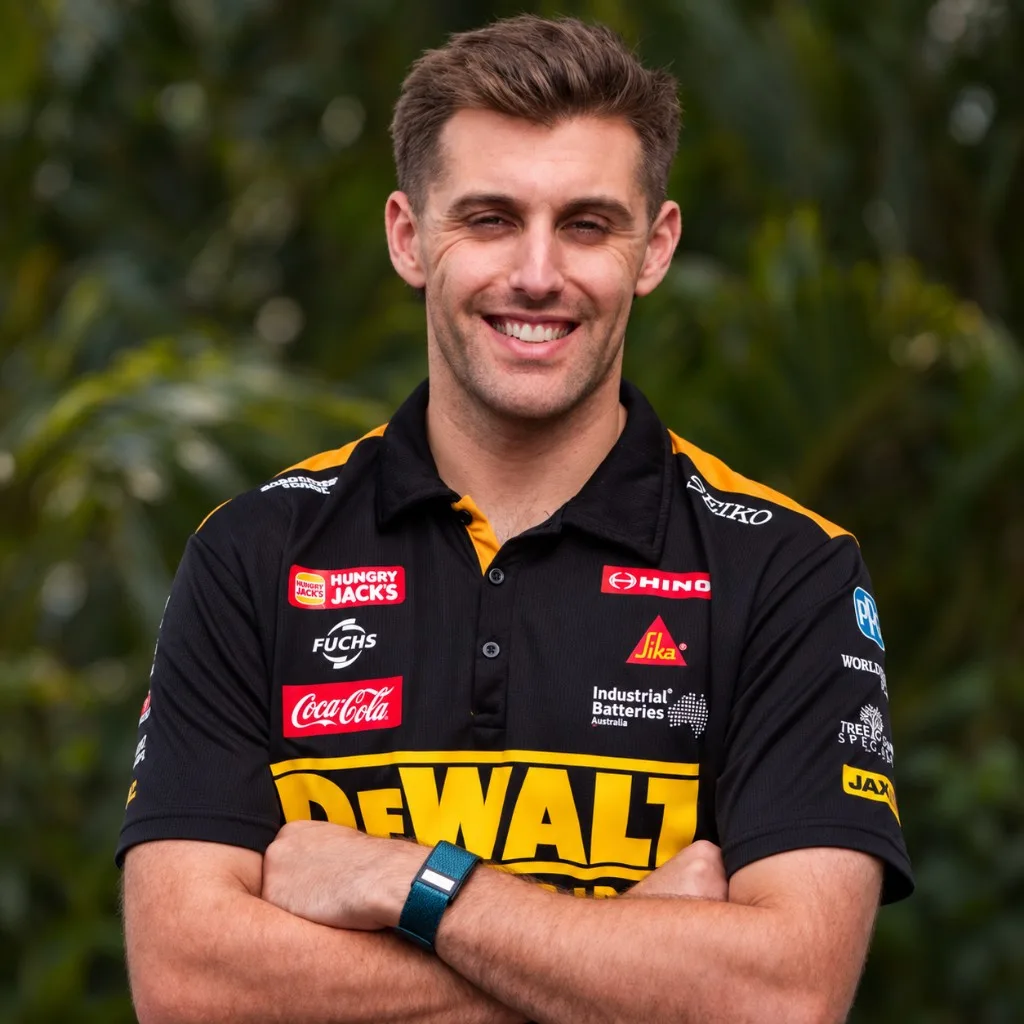 Anton De Pasquale wearing a Daintree Thrive Band with his arms crossed.