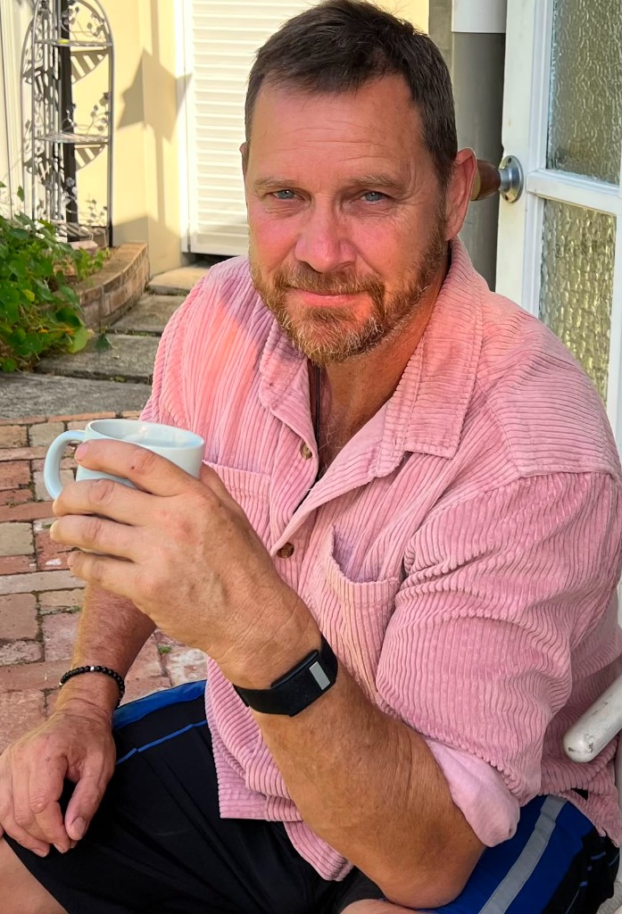 Craig wearing the Thrive Band