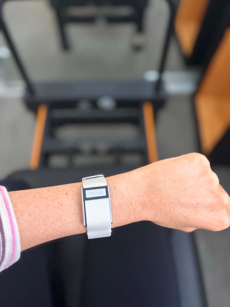 Megan wearing the Thrive Band